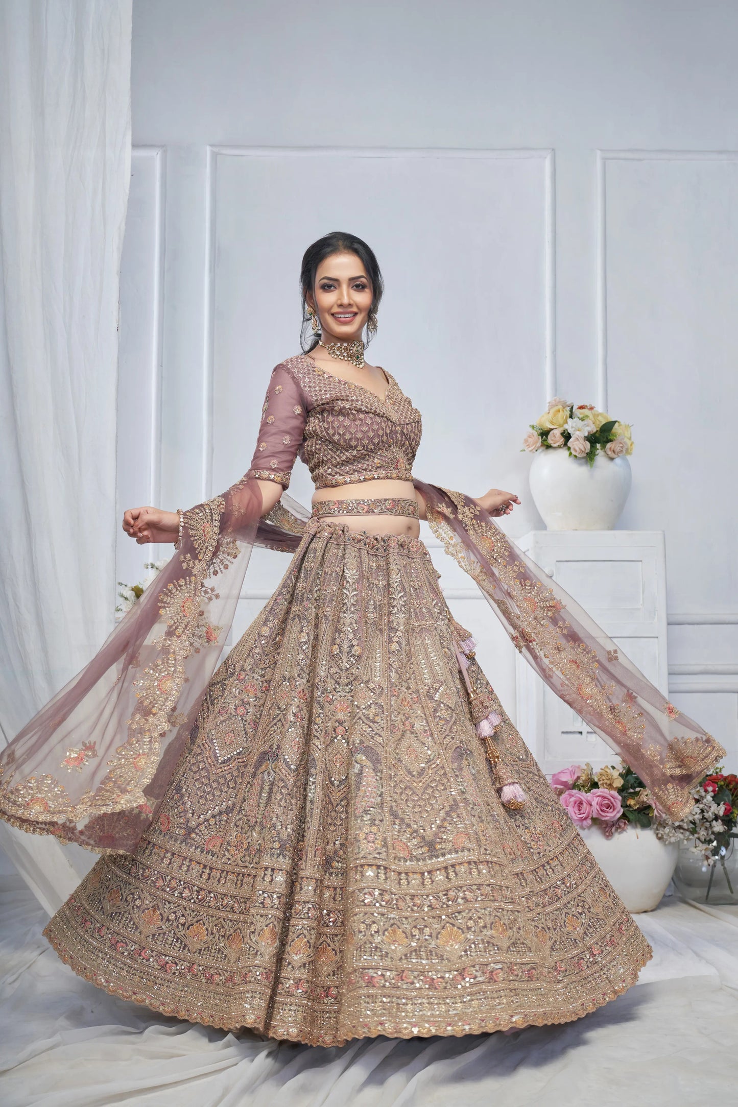 Royal Grandeur bridal  Purple Soft Net Lehenga with Paisley and Peacock Motifs & Heavy Embroidery