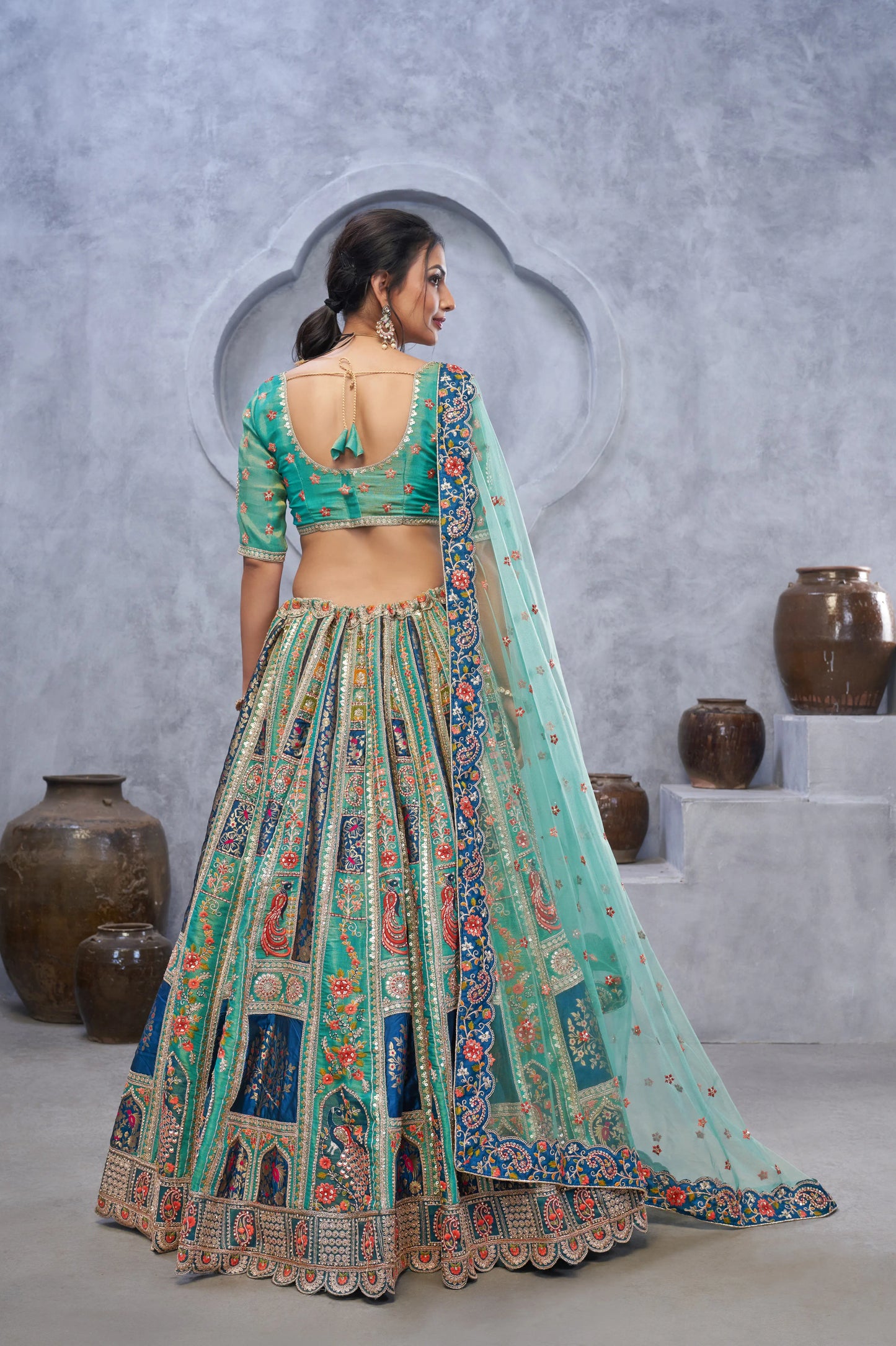 The bagh collection:Graceful Green Lenega embedded by Thread and Sequin Embellished Lehengas