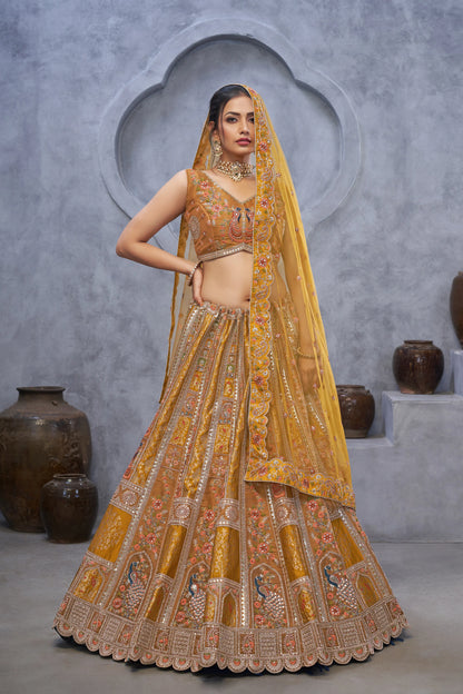 The bagh collection: Marvelous Mustard with  peacock Embroidered bridal lehenga