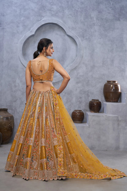 The bagh collection: Marvelous Mustard with  peacock Embroidered bridal lehenga