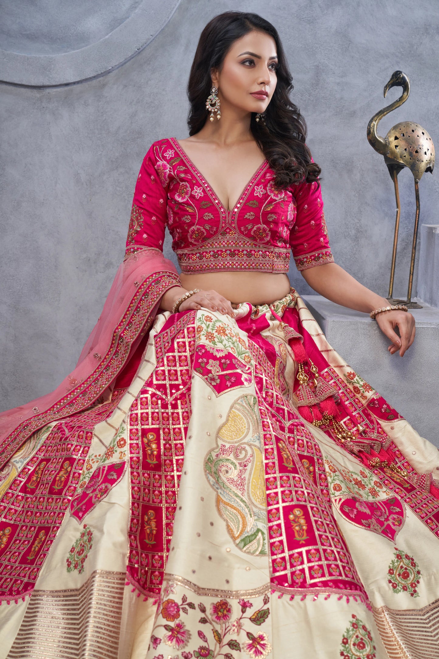 Regal Elegance: The Red and White Raw Silk Masterpiece Lehenga with Paisley Motifs and Sheer Pink Dupatta