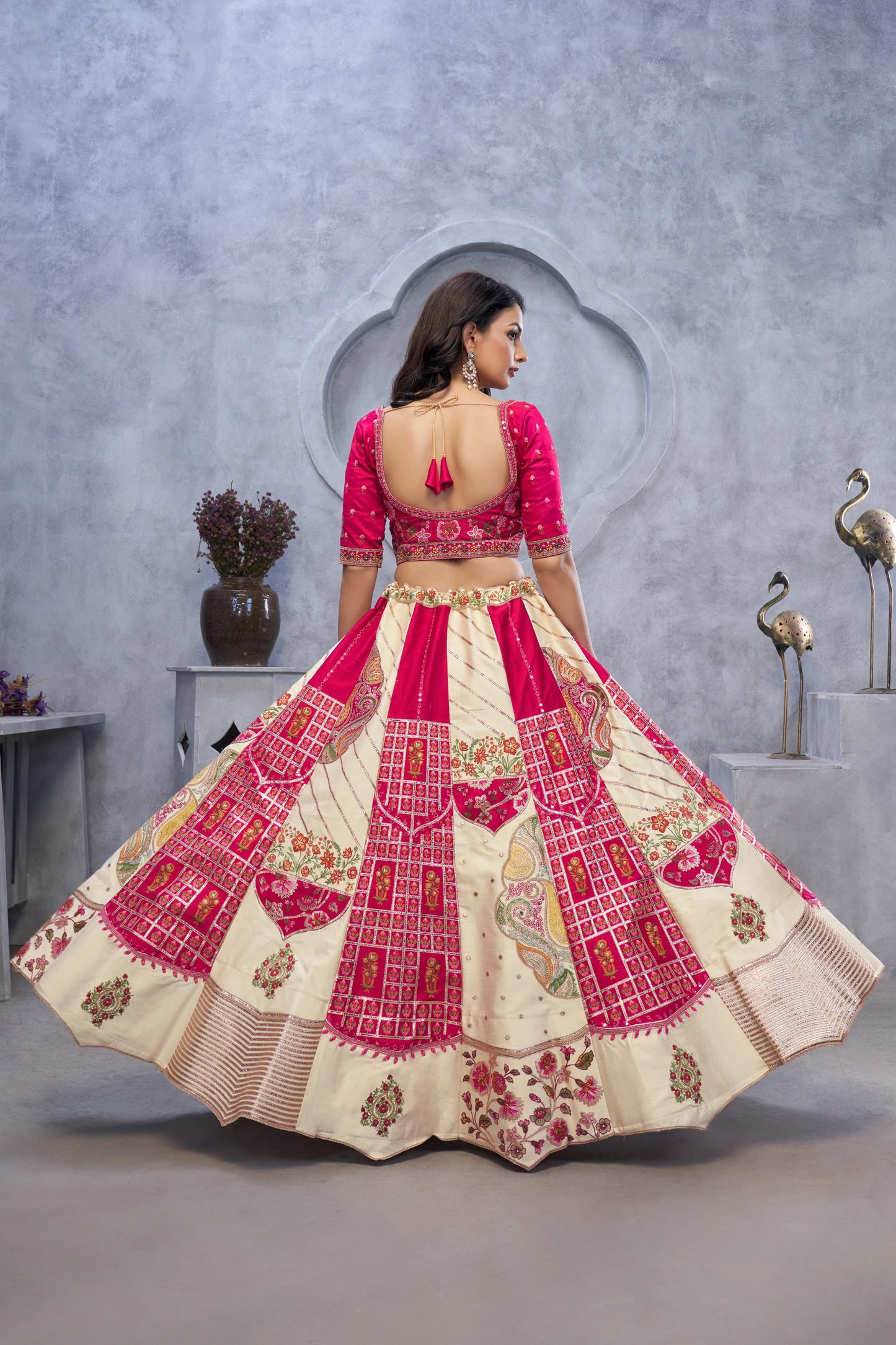 Regal Elegance: The Red and White Raw Silk Masterpiece Lehenga with Paisley Motifs and Sheer Pink Dupatta