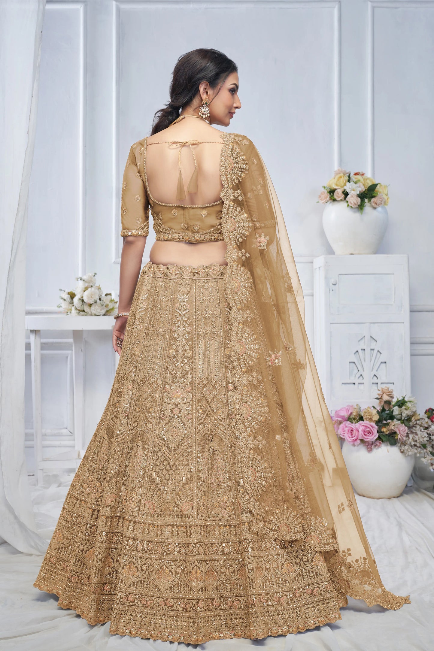 Royal Grandeur bridal  Golden  Lehenga with Paisley and Peacock Motifs & Heavy Embroidery