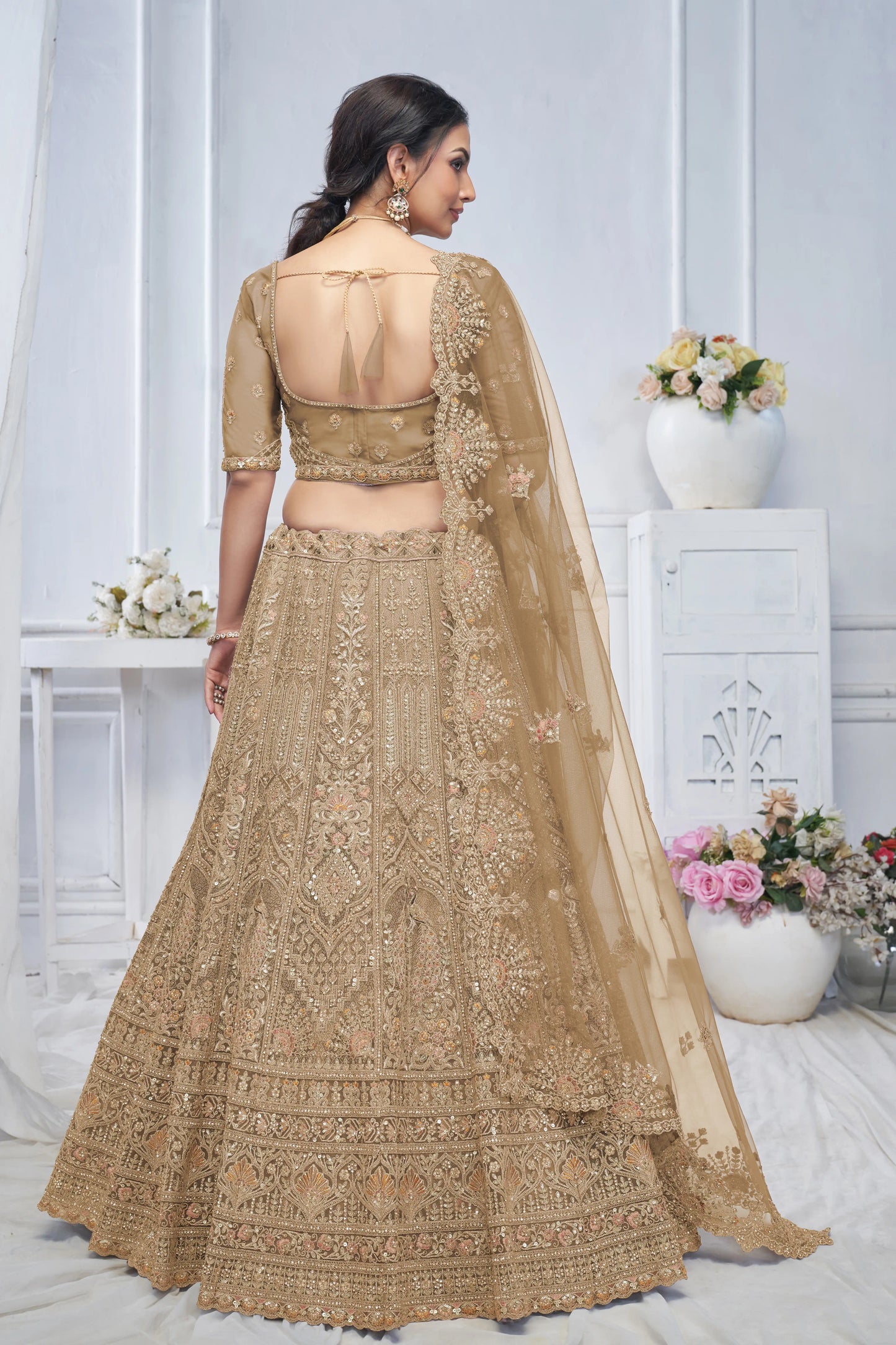 Royal Grandeur bridal Brown  Lehenga with Paisley and Peacock Motifs & Heavy Embroidery