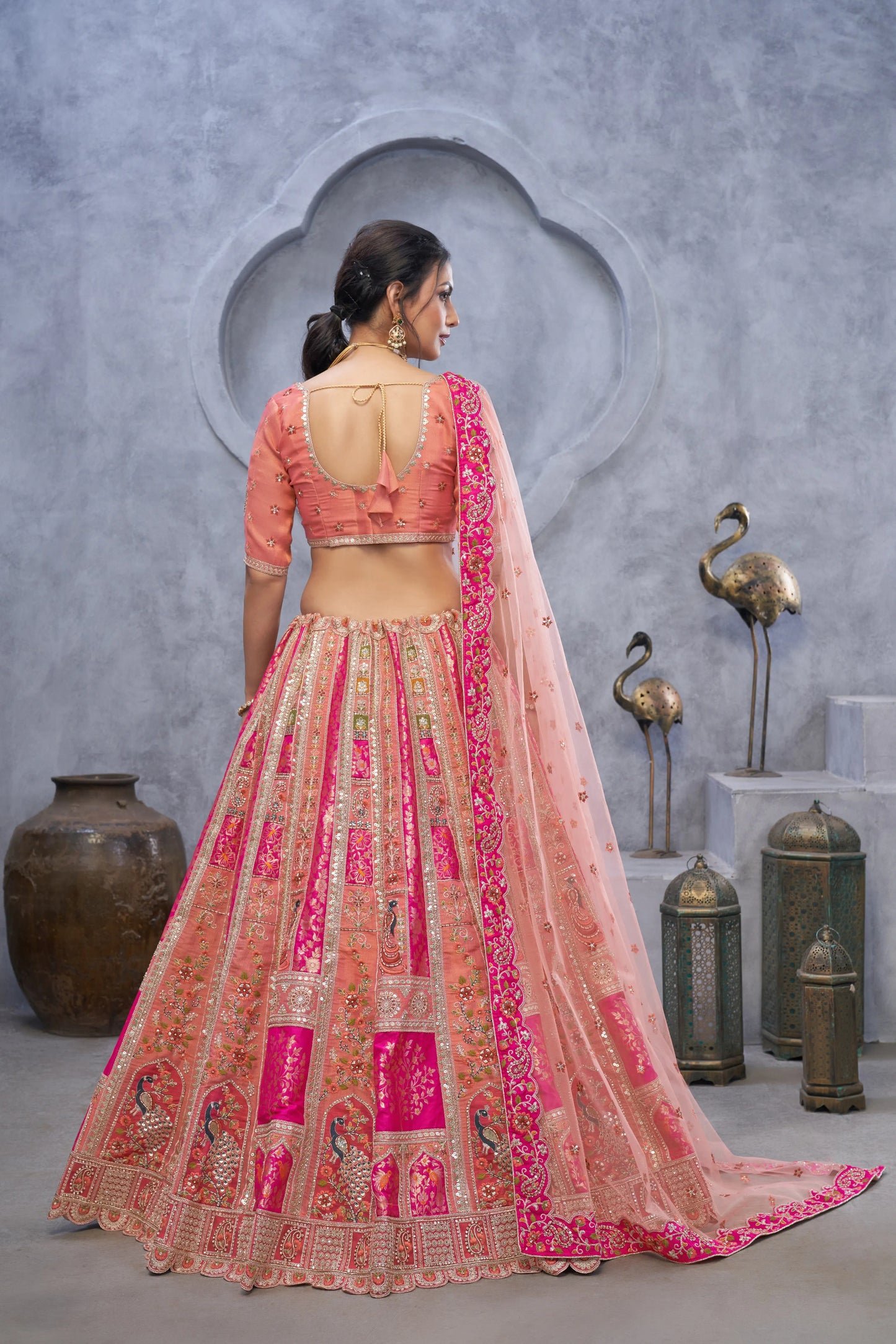 The bagh collection: Peach Lenega embodded by Thread and Sequin Embellished Lehengas