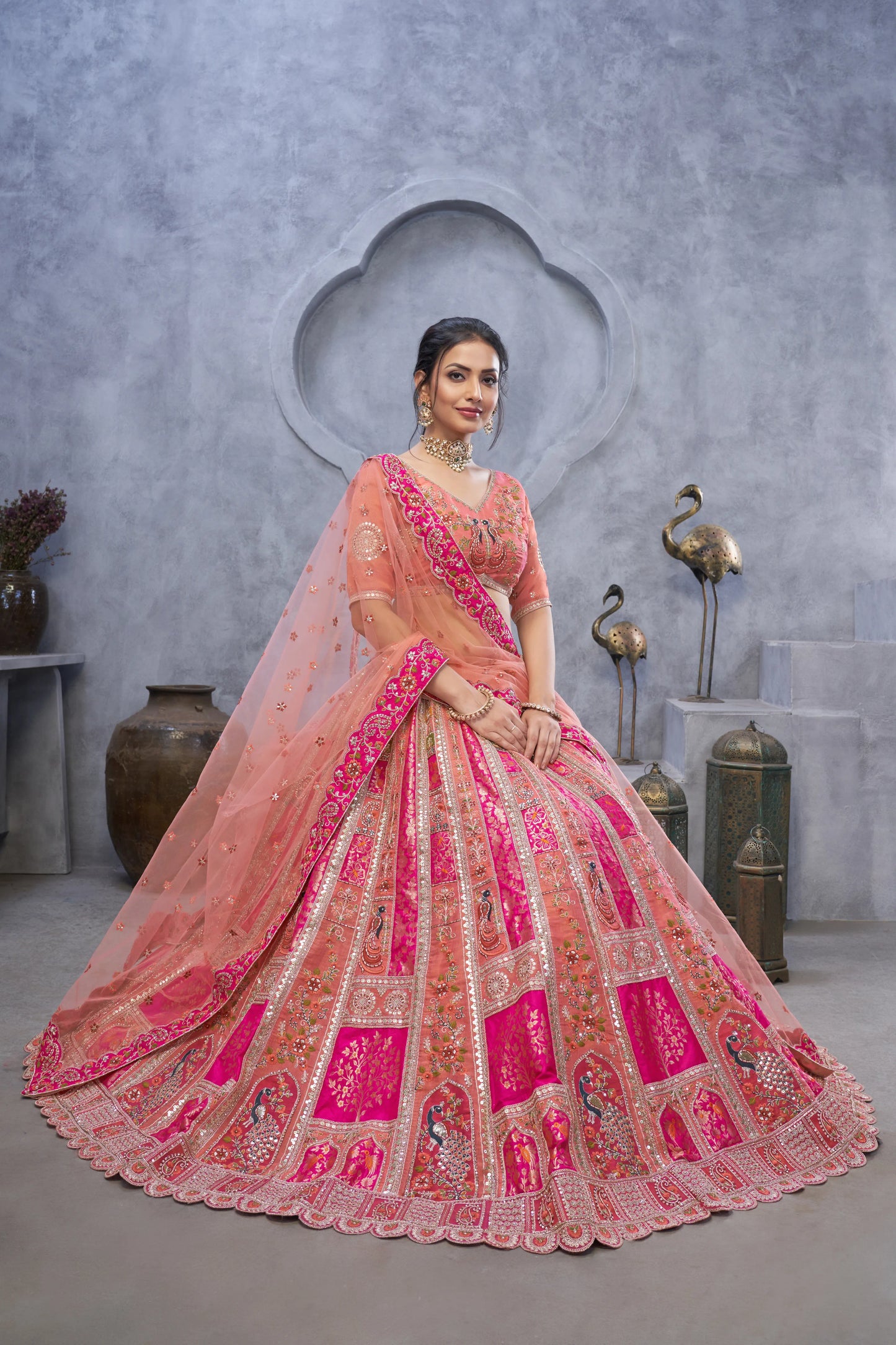 The bagh collection: Peach Lenega embodded by Thread and Sequin Embellished Lehengas