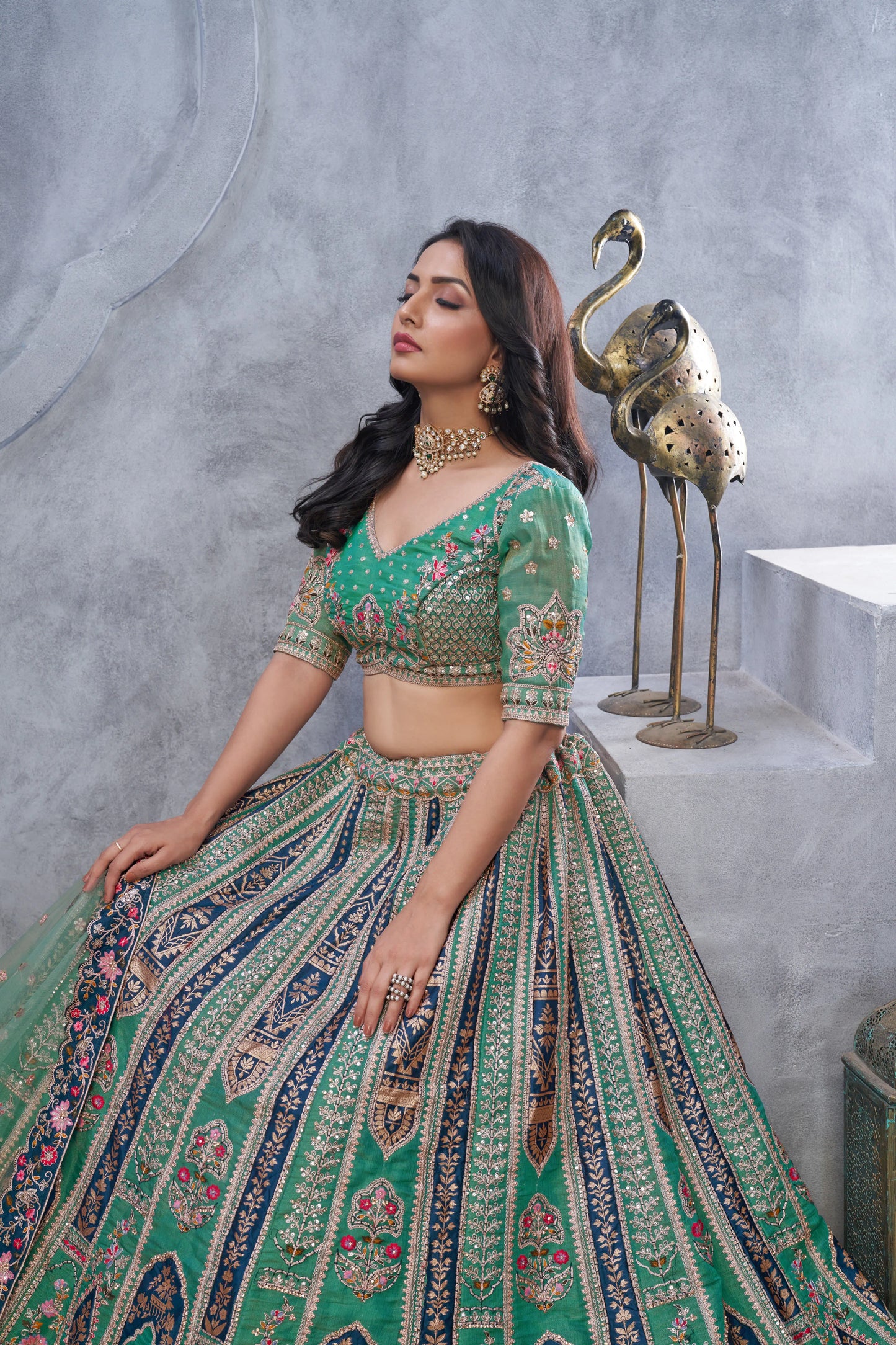 Organza Silk Intricate Paisley Motifs Traditional Embroidered Wedding Lehenga Choli In Green Color With Soft Net Dupatta