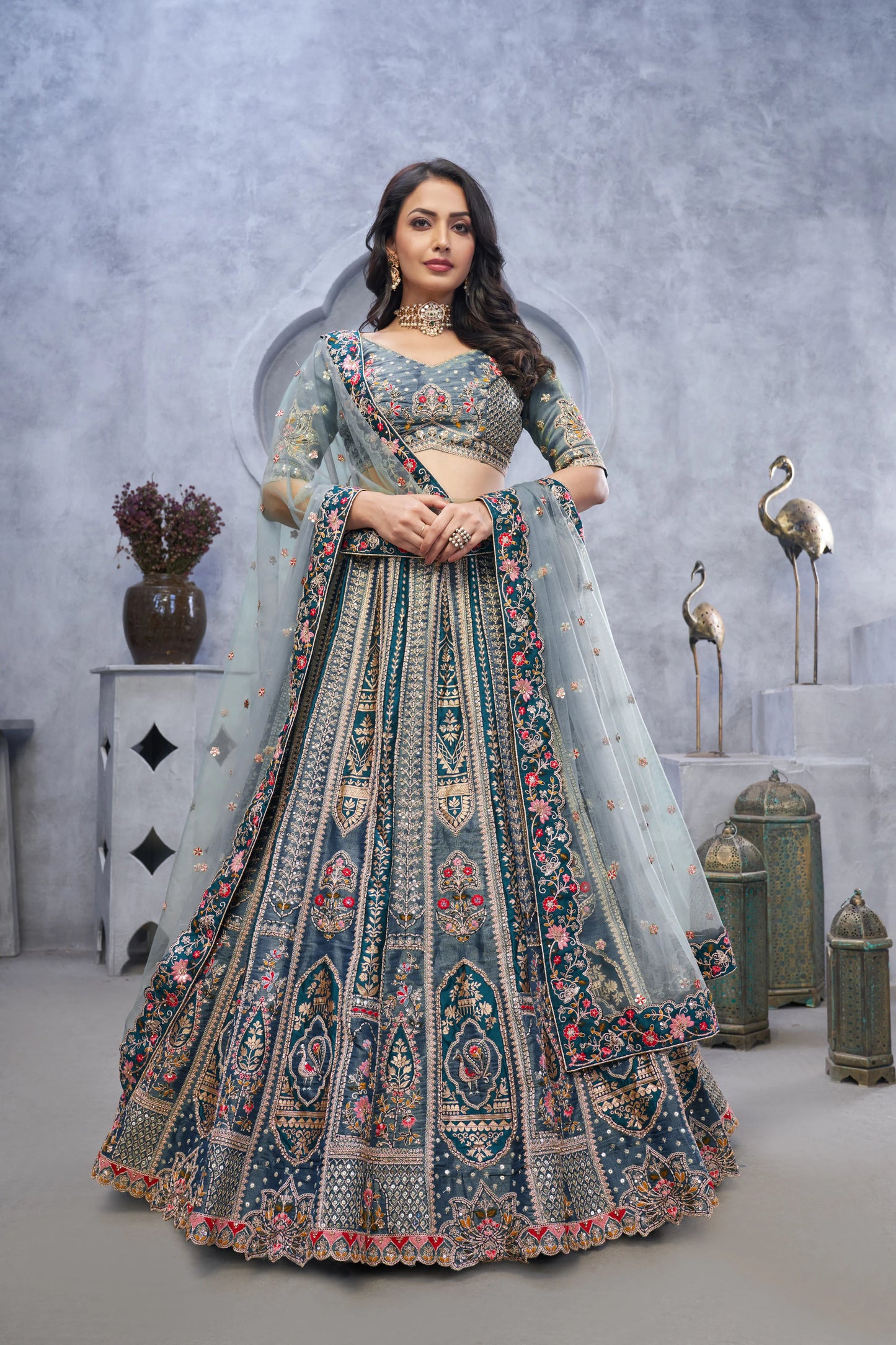 Organza Silk Intricate Paisley Motifs Traditional Embroidered Wedding Lehenga Choli In Grey color With Soft Net Dupatta