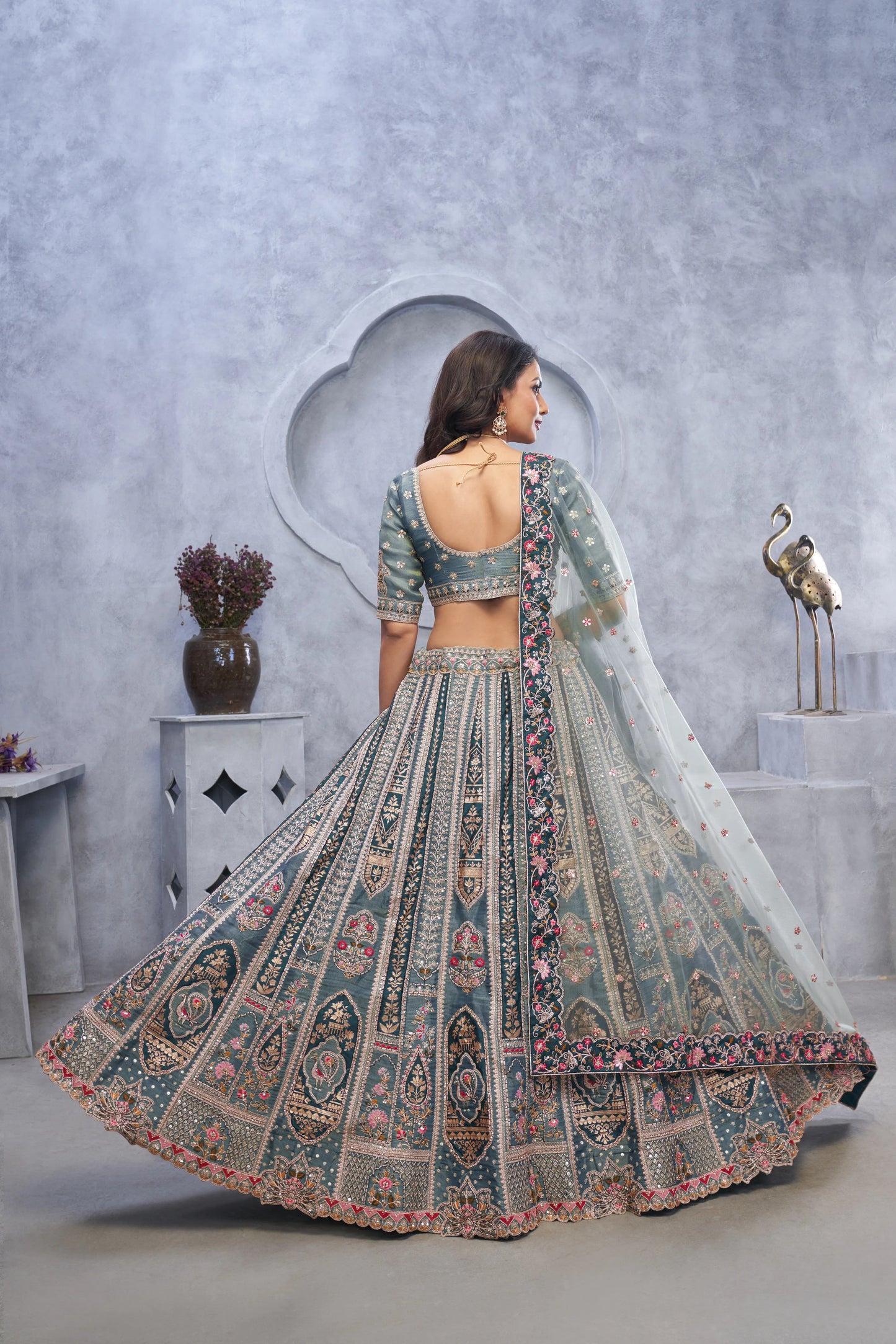 Organza Silk Intricate Paisley Motifs Traditional Embroidered Wedding Lehenga Choli In Grey color With Soft Net Dupatta