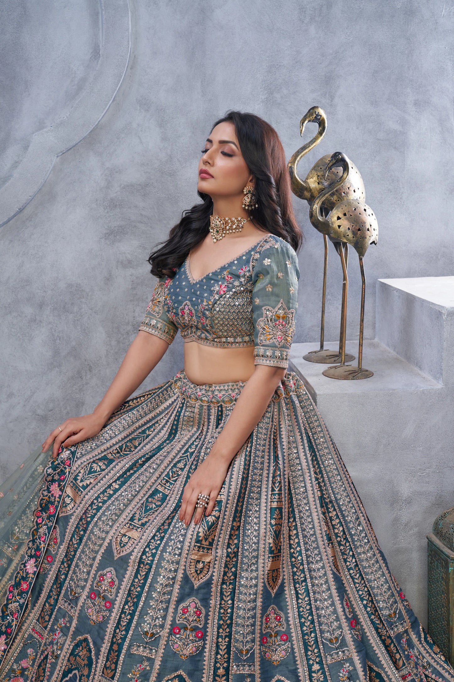 Organza Silk Intricate Paisley Motifs Traditional Embroidered Wedding Lehenga Choli In Grey color With Soft Net Dupatta