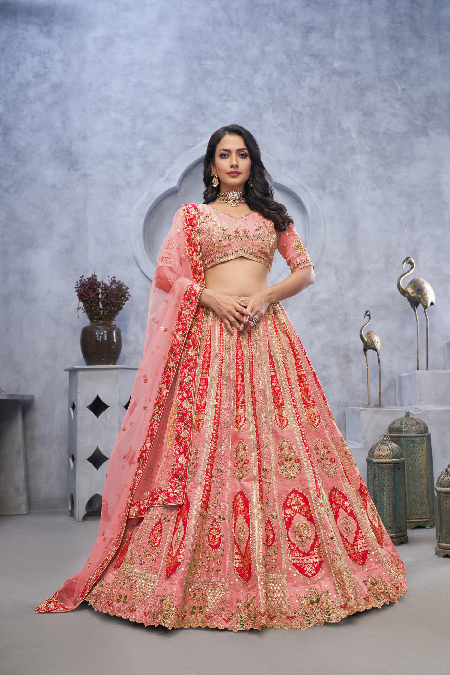 Organza Silk Intricate Paisley Motifs Traditional Embroidered Wedding Lehenga Choli In Pink color With Soft Net Dupatta