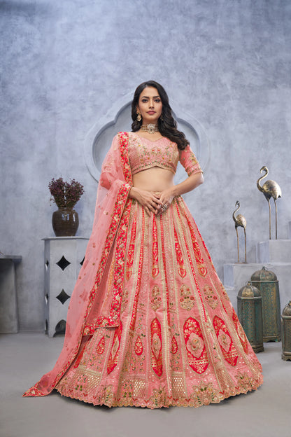 Organza Silk Intricate Paisley Motifs Traditional Embroidered Wedding Lehenga Choli In Pink color With Soft Net Dupatta