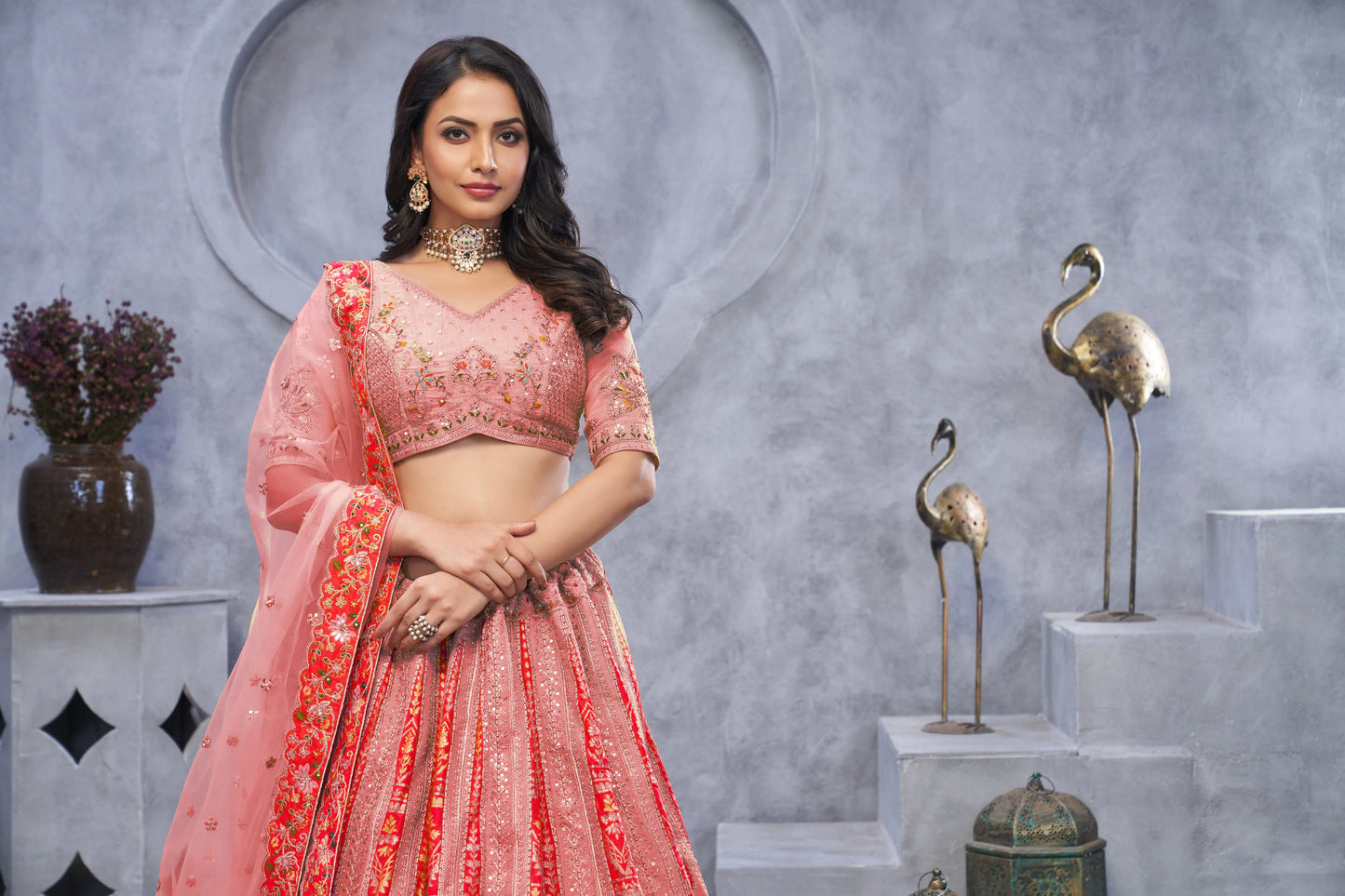 Organza Silk Intricate Paisley Motifs Traditional Embroidered Wedding Lehenga Choli In Pink color With Soft Net Dupatta