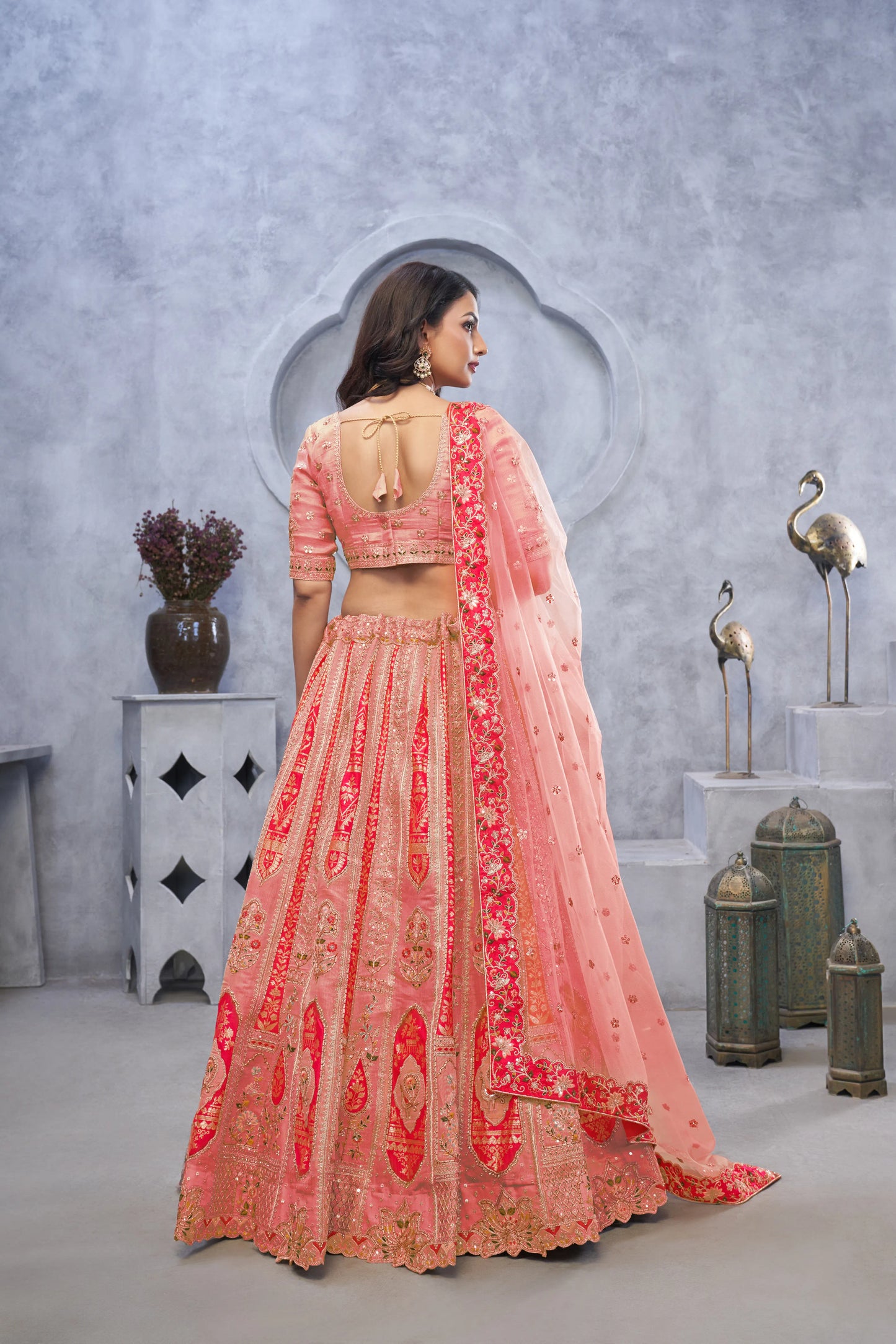 Organza Silk Intricate Paisley Motifs Traditional Embroidered Wedding Lehenga Choli In Pink color With Soft Net Dupatta