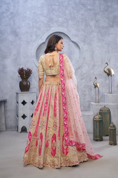 Organza Silk Intricate Paisley Motifs Traditional Embroidered Wedding Lehenga Choli in Chicku color With Soft Net Dupatta