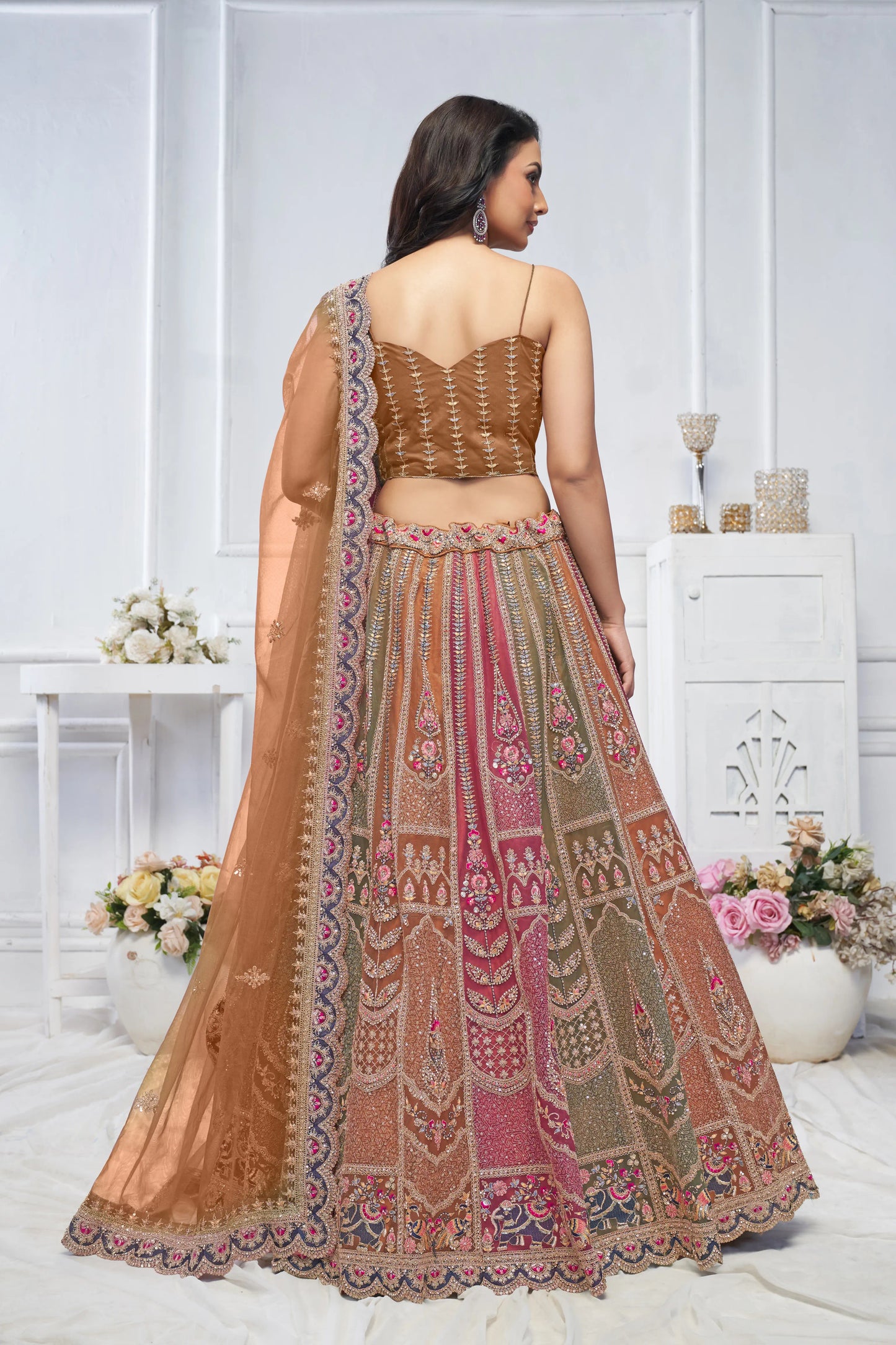 Majestic Musatrd Zari Weaving Net Lehenga Choli With Dupatta