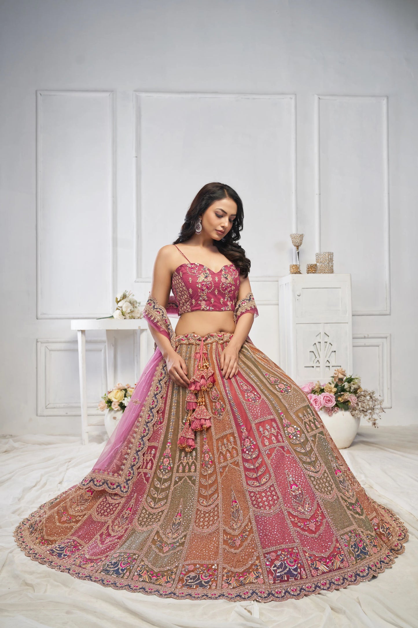 Majestic Multi-Color Zari Weaving Net Lehenga Choli With Dupatta