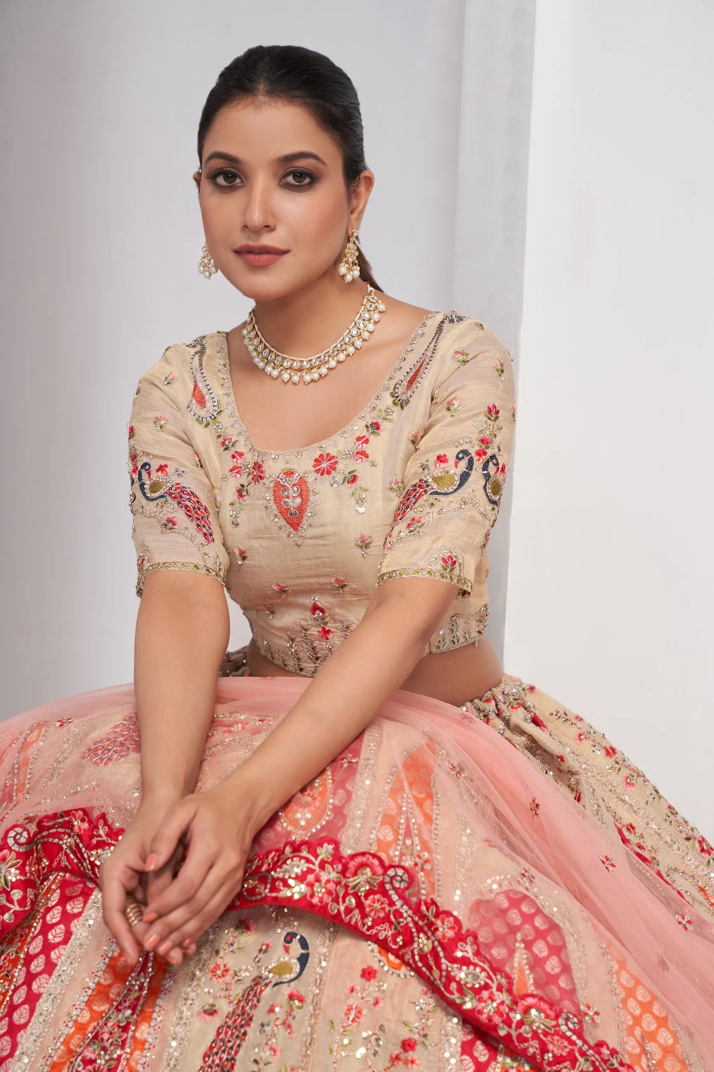 Paisely motifs beautiful peacock embroidered in Bright Cream bridal lehenga choli set