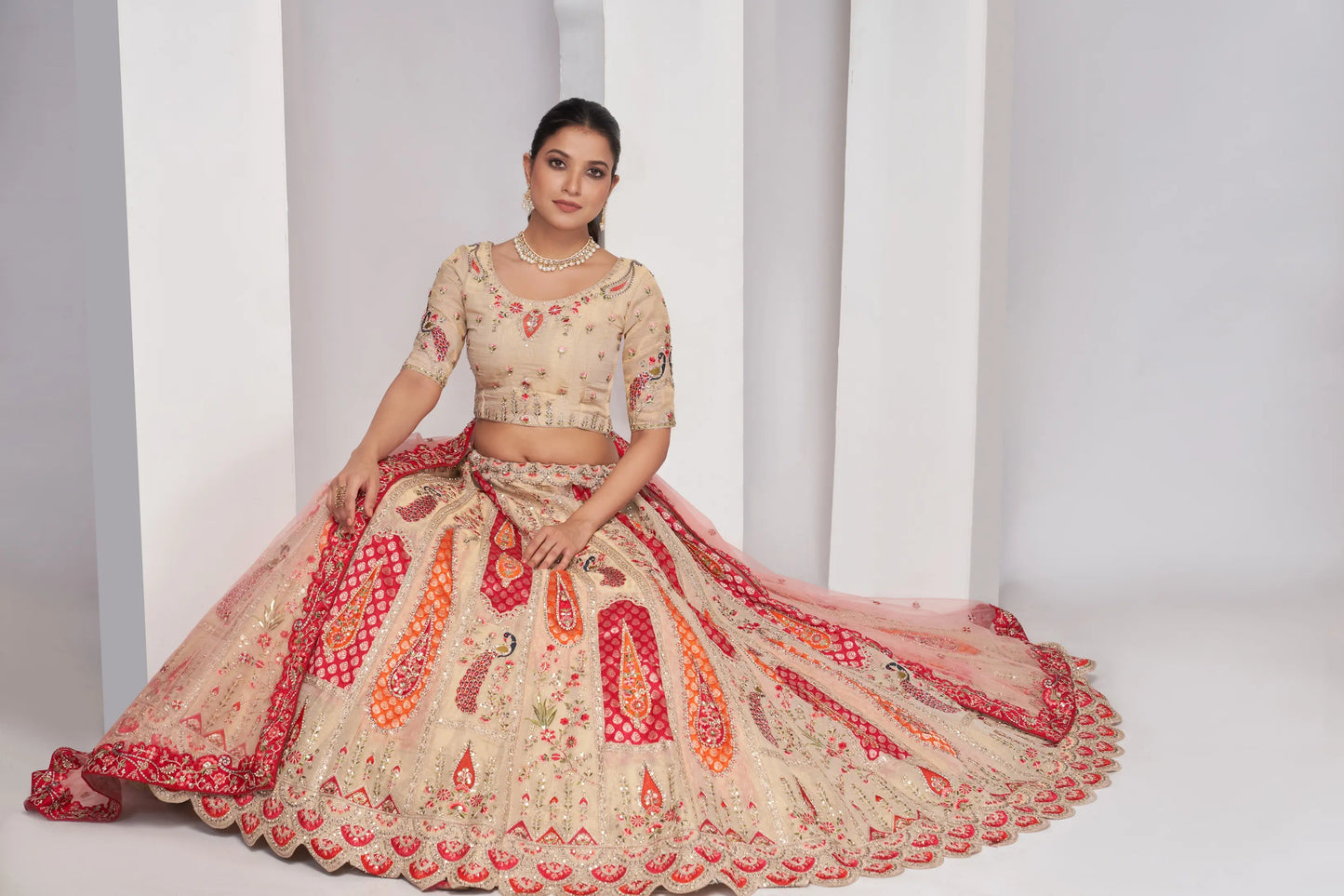 Paisely motifs beautiful peacock embroidered in Bright Cream bridal lehenga choli set