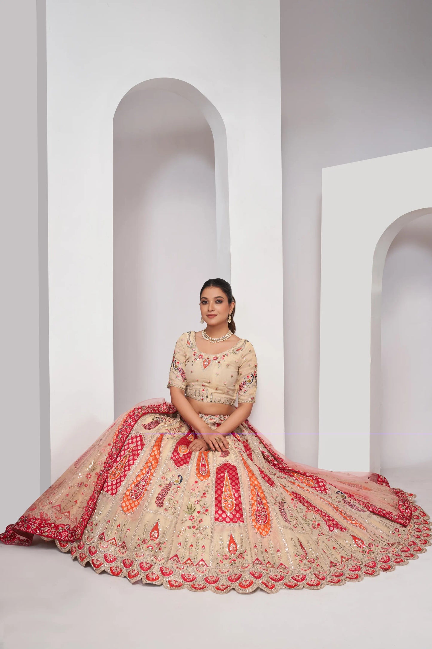 Paisely motifs beautiful peacock embroidered in Bright Cream bridal lehenga choli set