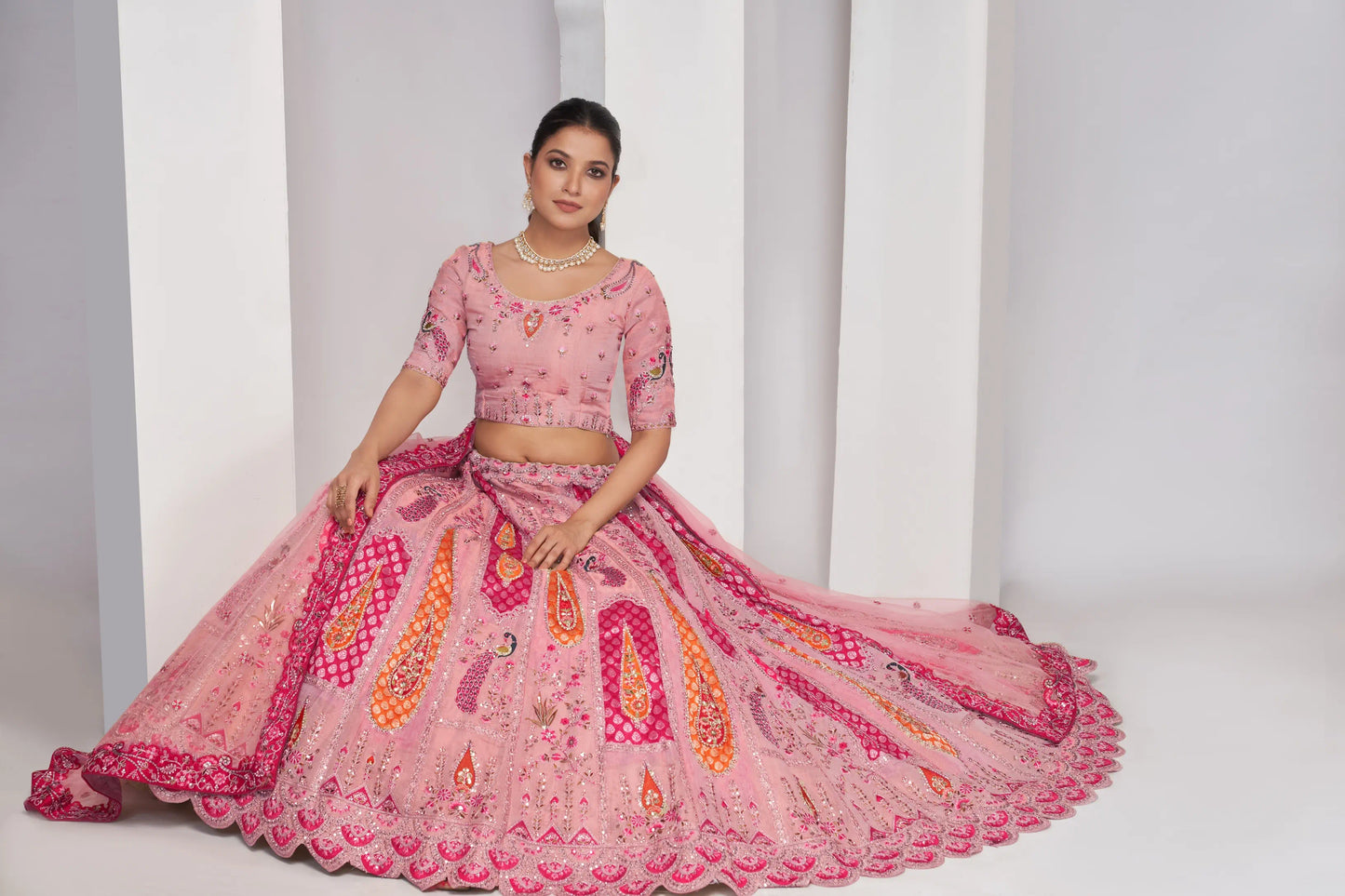 Elegenat Peacock and Paisely motifs rose Pink  Silk color traditional lehenga choli