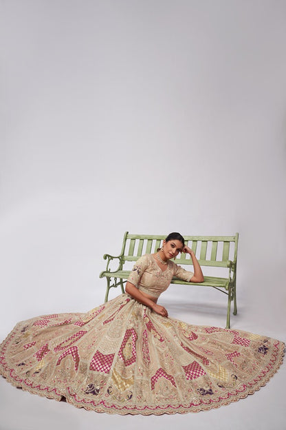 Ivory Orgenza Silk intricate paisley Motifs traditional  embroidered  wedding Lehenga.