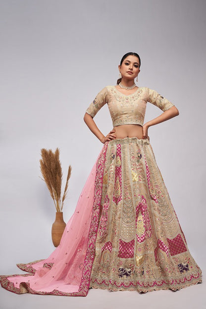 Ivory Orgenza Silk intricate paisley Motifs traditional  embroidered  wedding Lehenga.