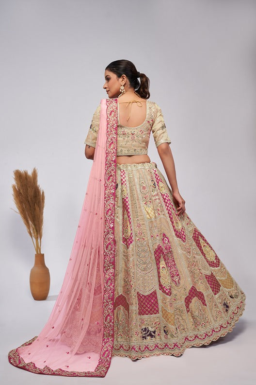 Ivory Orgenza Silk intricate paisley Motifs traditional  embroidered  wedding Lehenga.