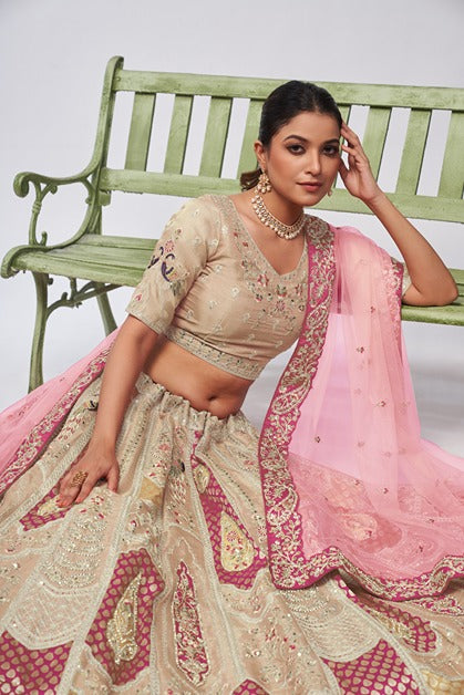 Ivory Orgenza Silk intricate paisley Motifs traditional  embroidered  wedding Lehenga.