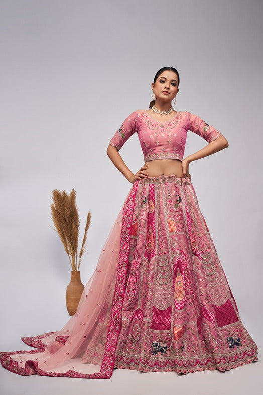 Pretty Pink Silk intricate paisley Motifs traditional embroidered  wedding Lehenga.