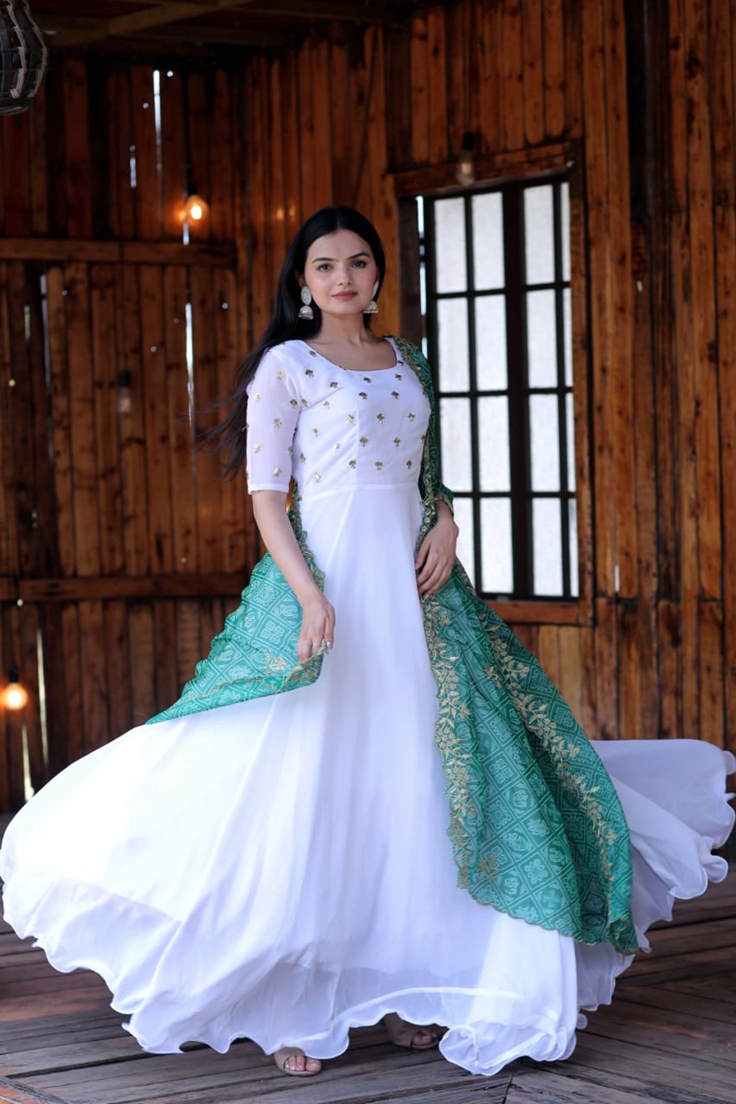 Fastival Special White Faux Georgette Gown With Embroidery