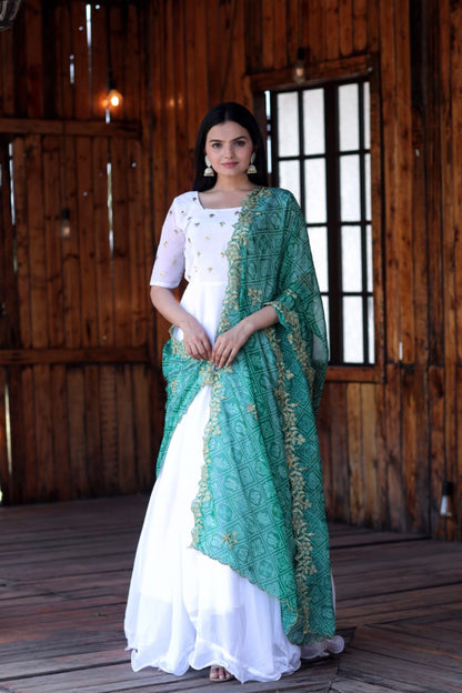 Fastival Special White Faux Georgette Gown With Embroidery