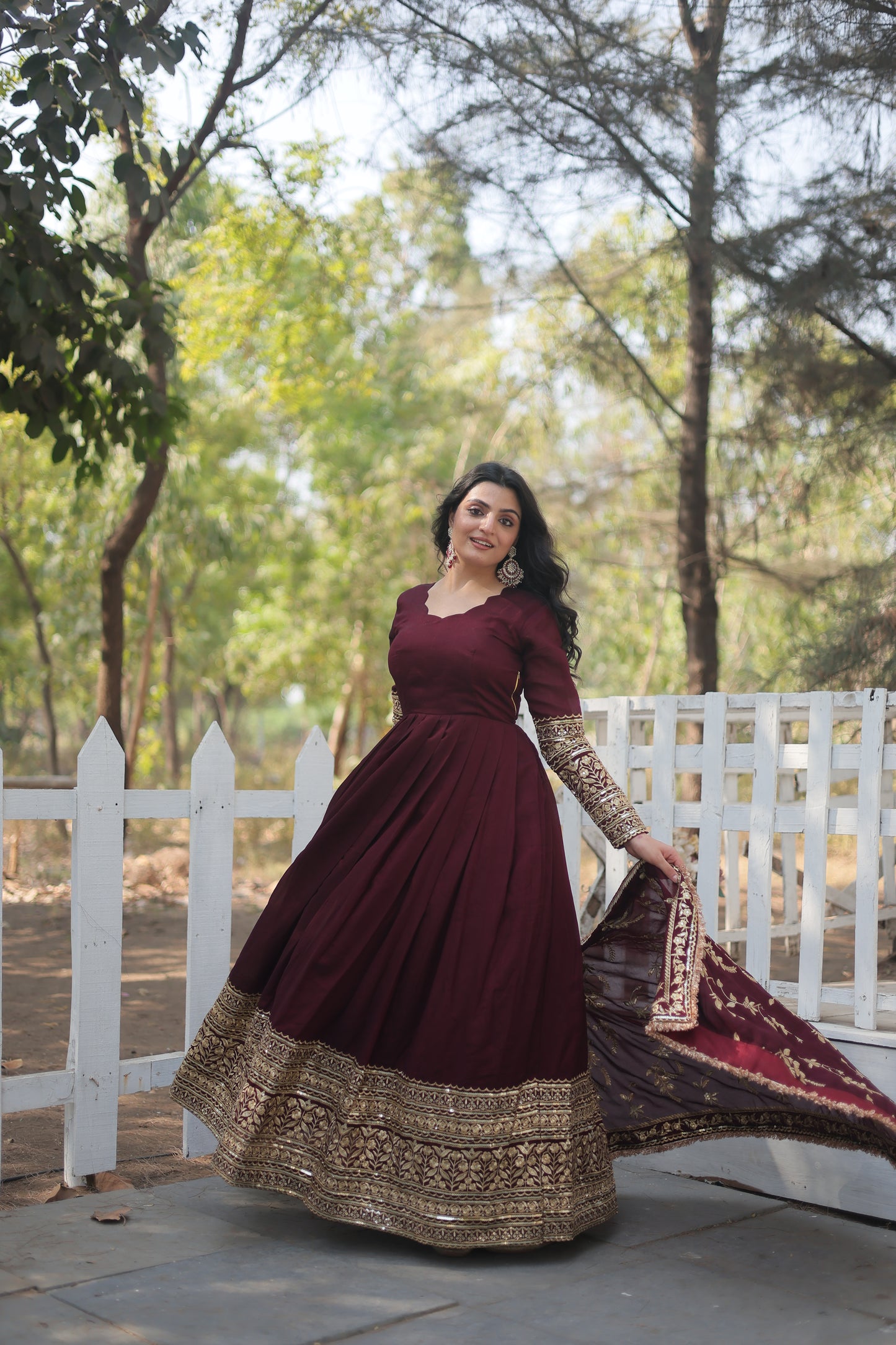 Traditional Maroon Gown With Golden Embroidery