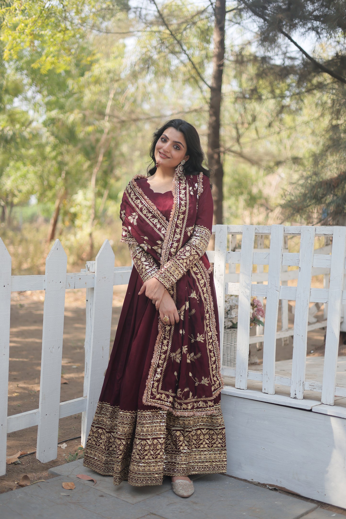 Traditional Maroon Gown With Golden Embroidery